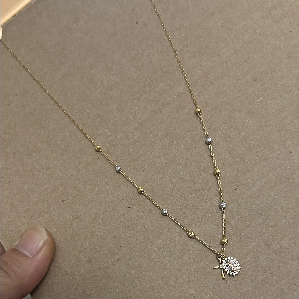 Elegant Gold and Silver Necklace with Cross Pendant
